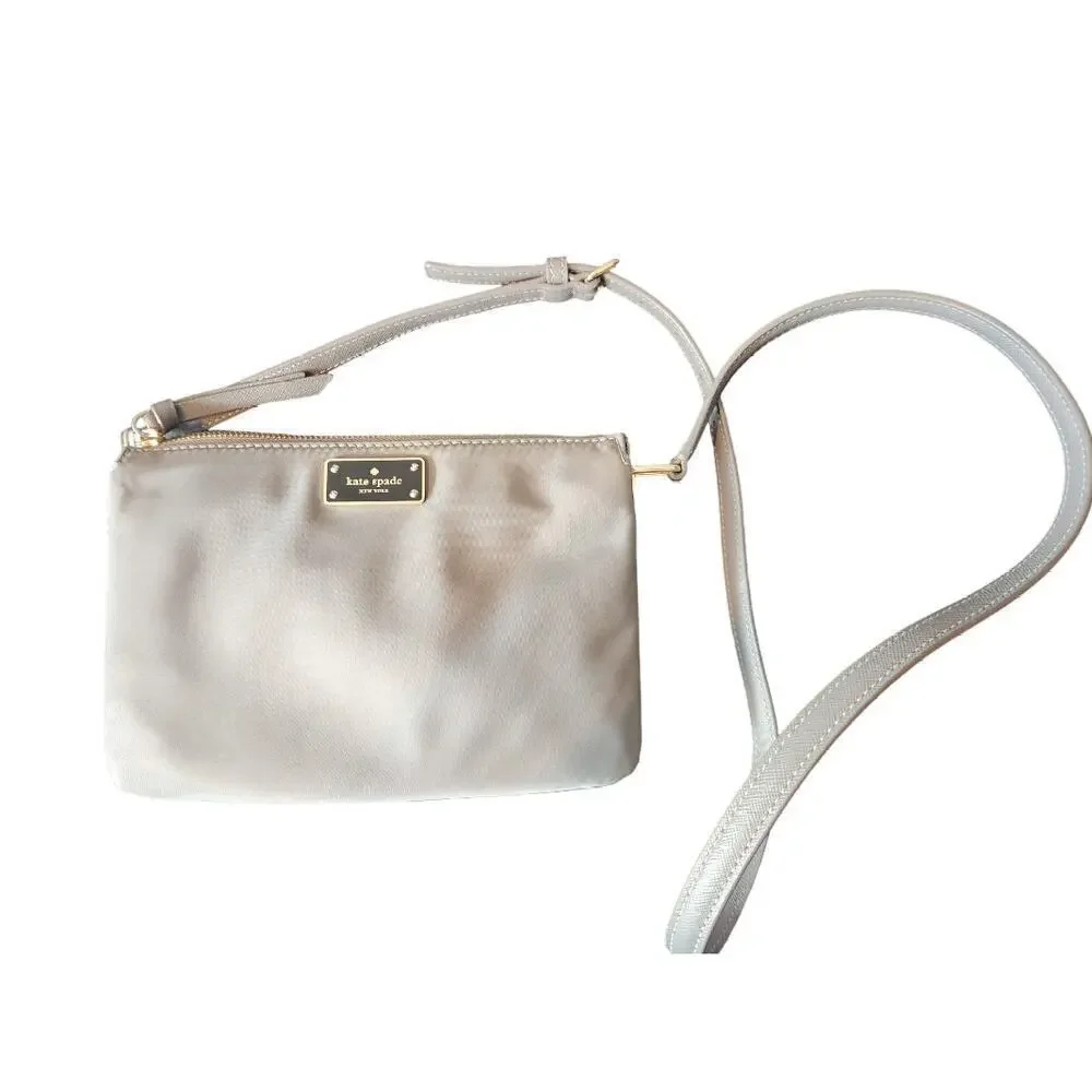 Kate Spade‎ New York gray nylon crossbody gold trim adjustable strap